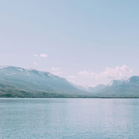 lake by mountains