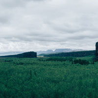 cloudy day over grass field